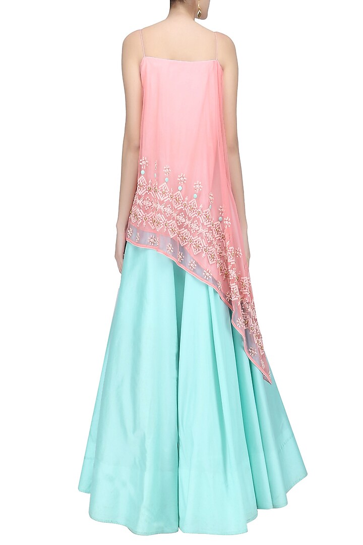 Salmon pink asymmetrical embroidered tunic and floral work skirt set available only at Pernia's Pop Up Shop.