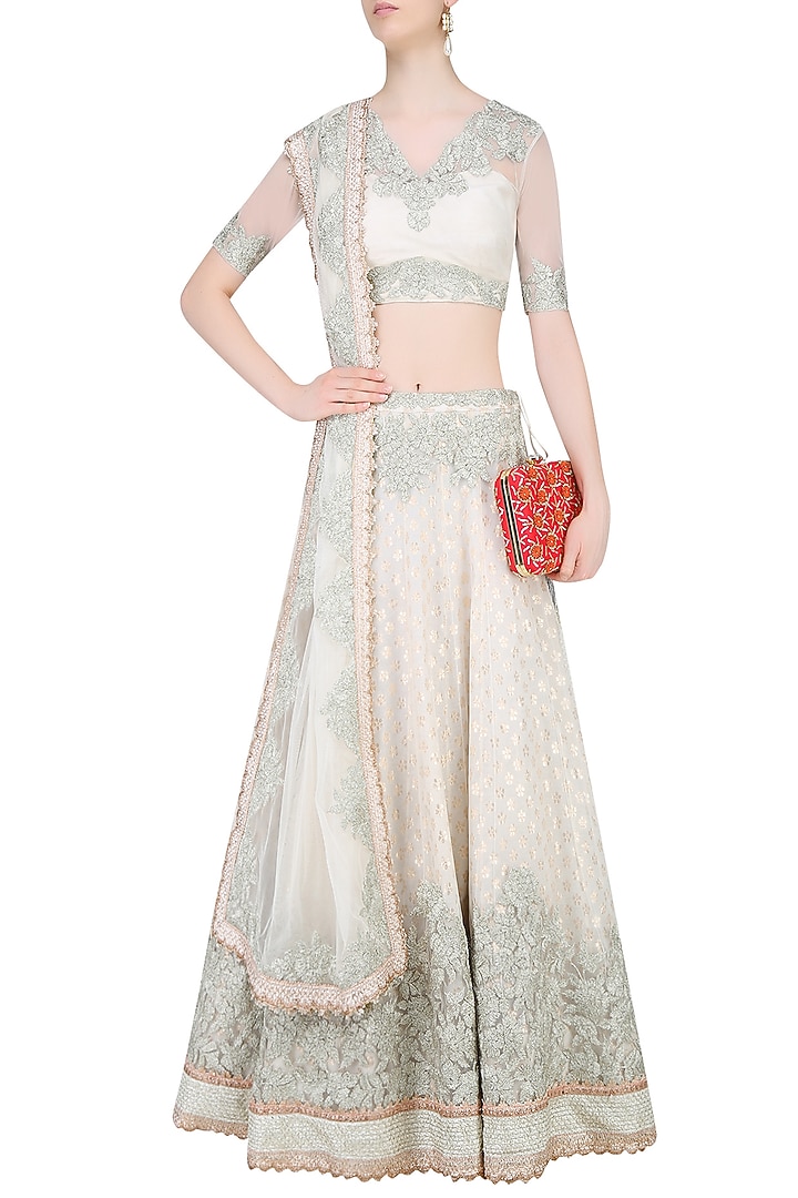 Ivory embroidered lehenga set available only at Pernia's Pop Up Shop.