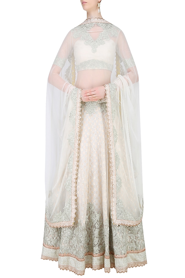 Ivory embroidered lehenga set available only at Pernia's Pop Up Shop.