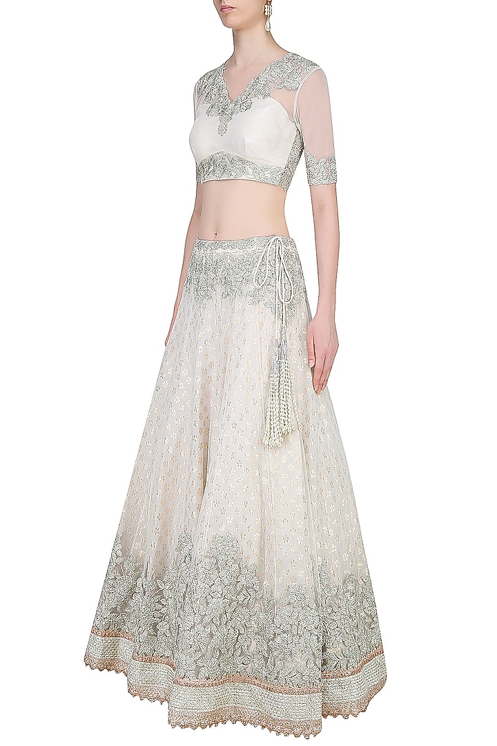 Ivory embroidered lehenga set available only at Pernia's Pop Up Shop.