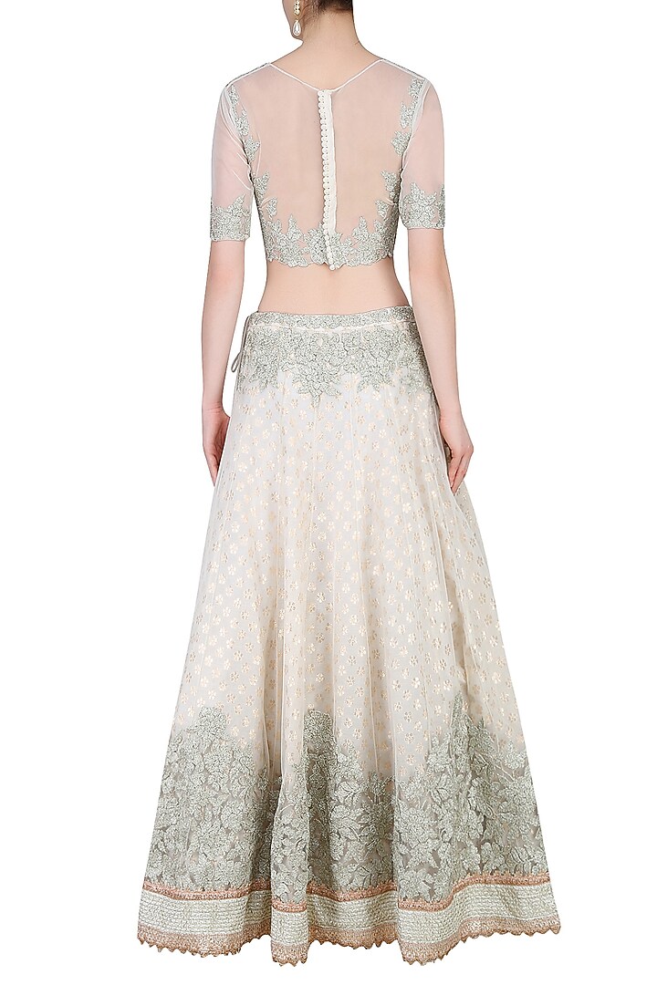 Ivory embroidered lehenga set available only at Pernia's Pop Up Shop.
