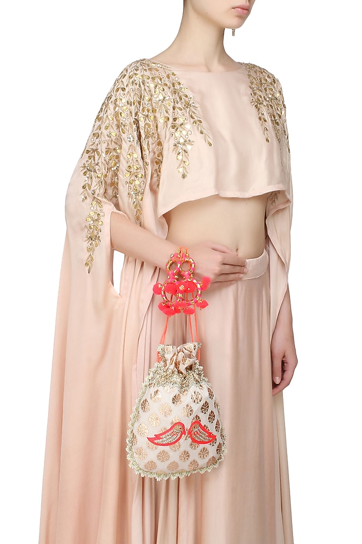 Ivory and orange floral and bird embroidered chanderi brocade polti bag available only at Pernia's Pop Up Shop