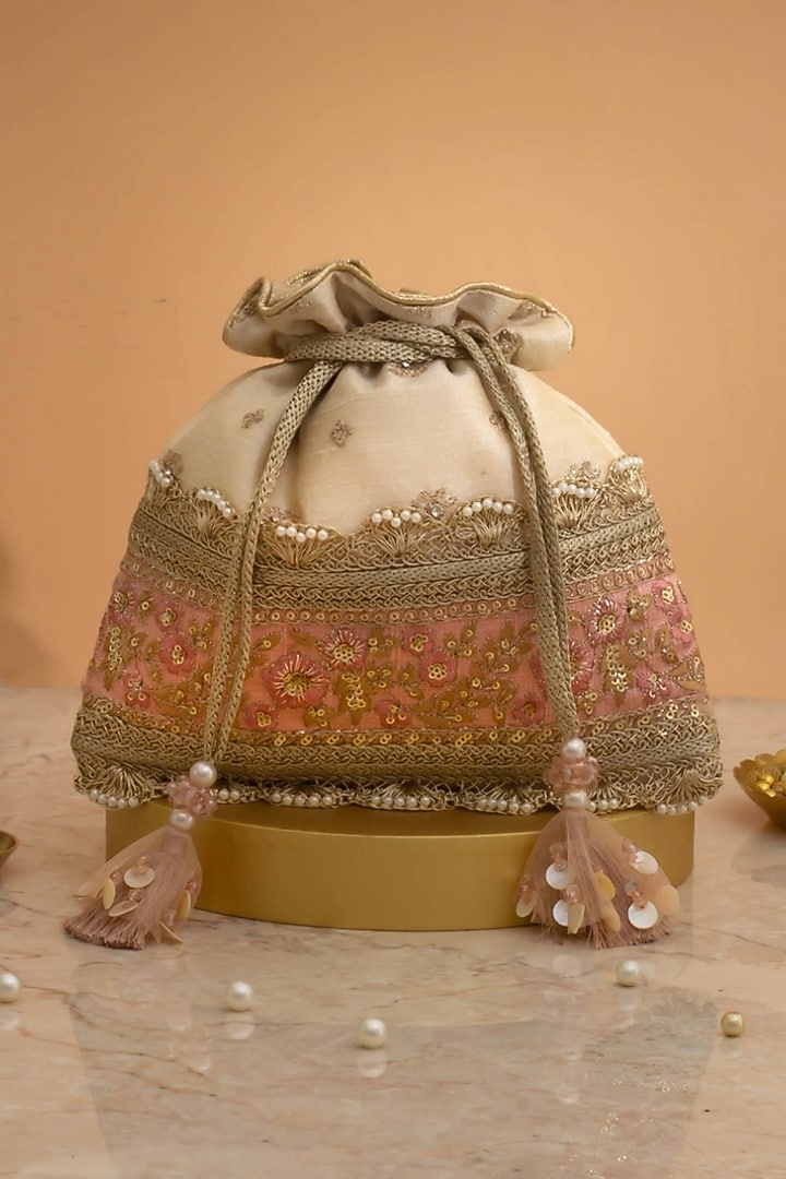 Beige Banarasi Silk & Tissue Zari Embroidered Potli by AMYRA at Pernia's Pop Up Shop