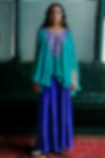 Blue Shimmer Silk Aari Embroidered Asymmetrical Kurta Set by ANANTI at Pernia's Pop Up Shop