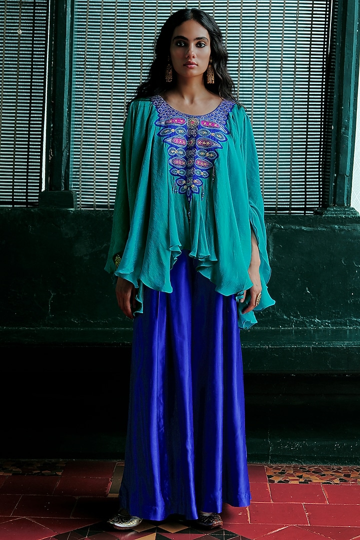 Blue Shimmer Silk Aari Embroidered Asymmetrical Kurta Set by ANANTI at Pernia's Pop Up Shop