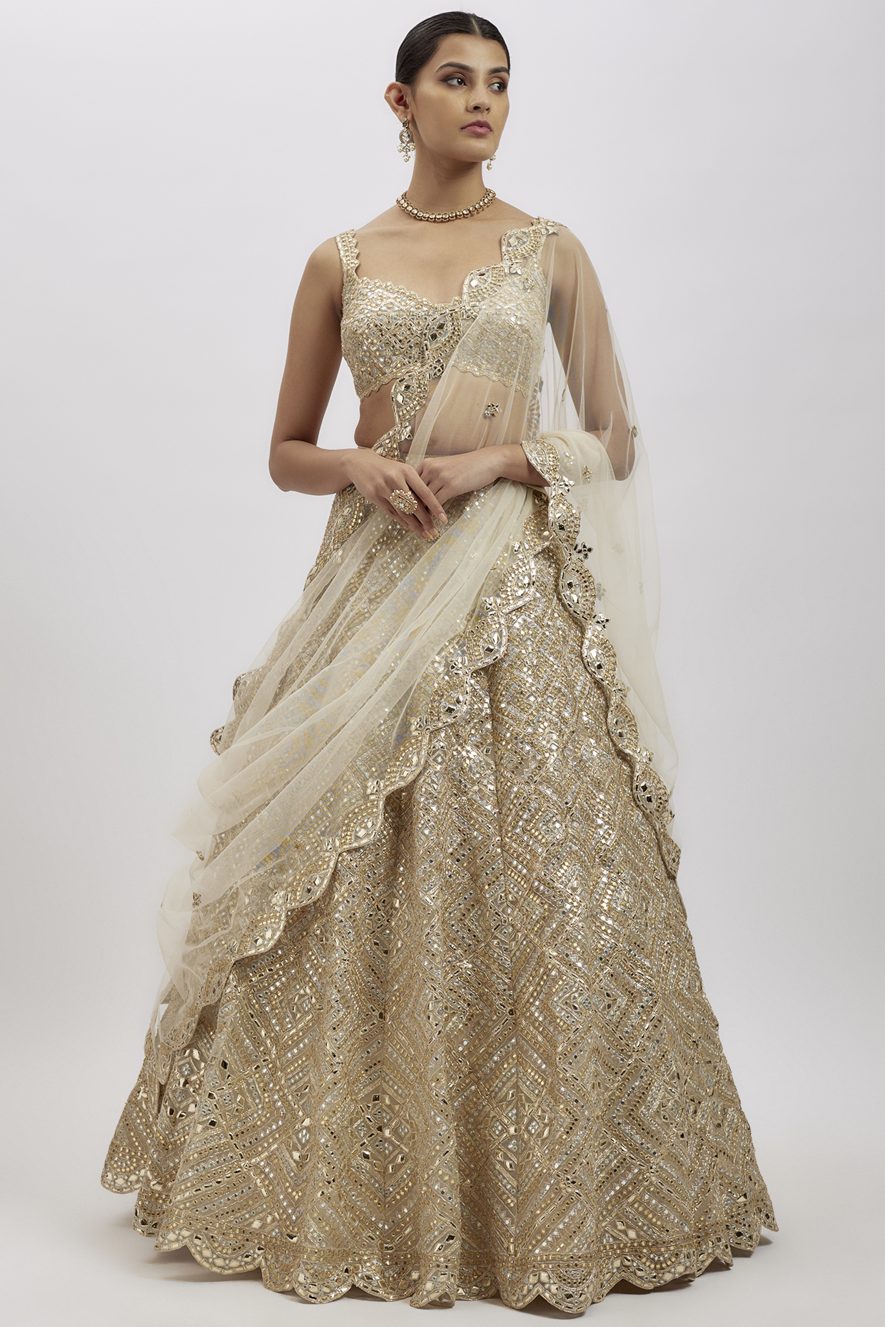 Ivory Net Bridal Lehenga Set by Aneesh Agarwaal at Pernia's Pop Up Shop