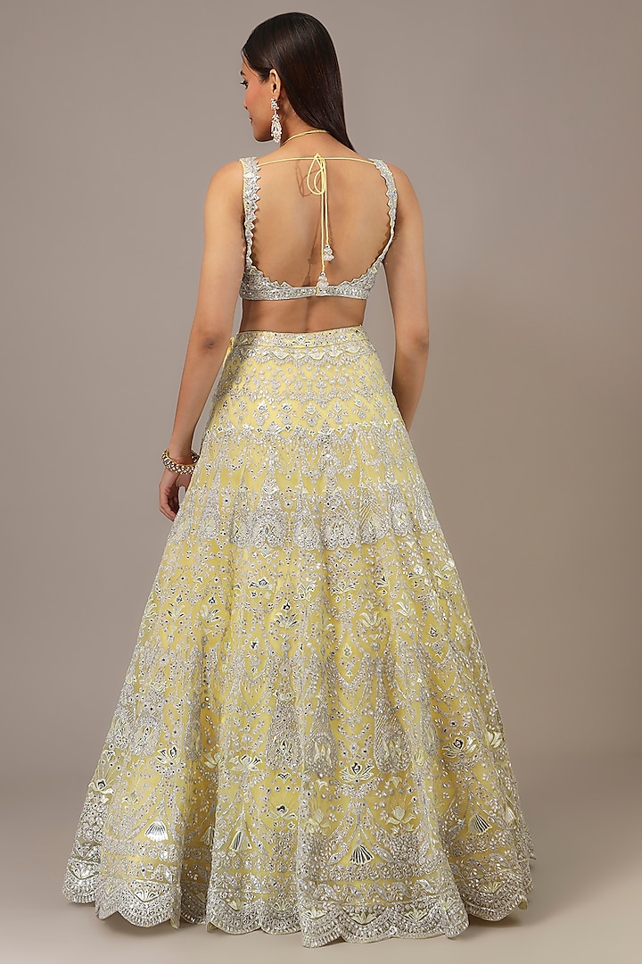 Pale Yellow Net Mirror Embroidered Scalloped Bridal Lehenga Set by Aneesh Agarwaal at Pernia's Pop Up Shop