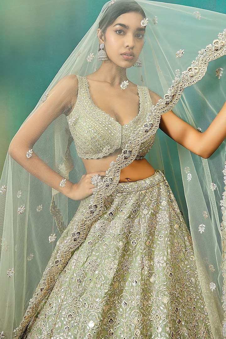 Sage Green Net Embroidered Bridal Lehenga Set by Aneesh Agarwaal at Pernia's Pop Up Shop