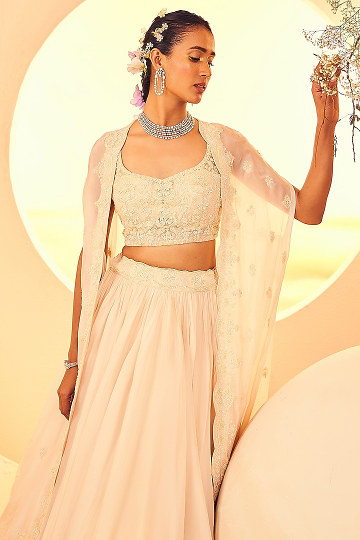 Dull Ivory Organza 3D Floral & Cutdana Hand Embroidered Cape Set by Aneesh Agarwaal at Pernia's Pop Up Shop