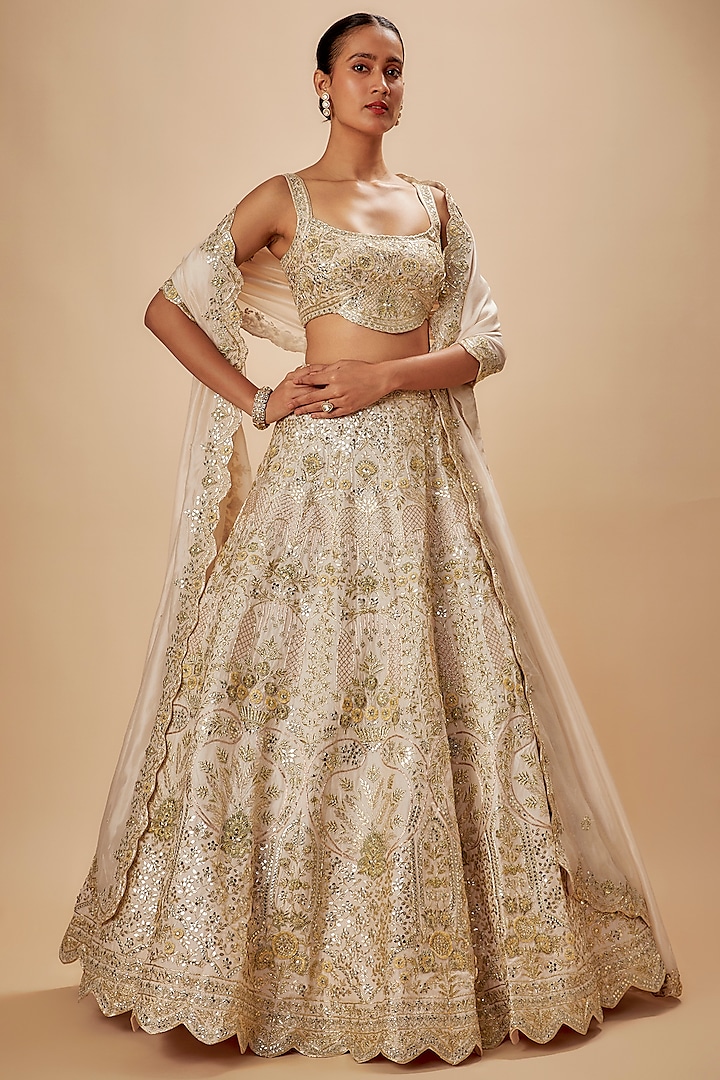 Ivory Silk Embroidered Lehenga Set by Aneesh Agarwaal