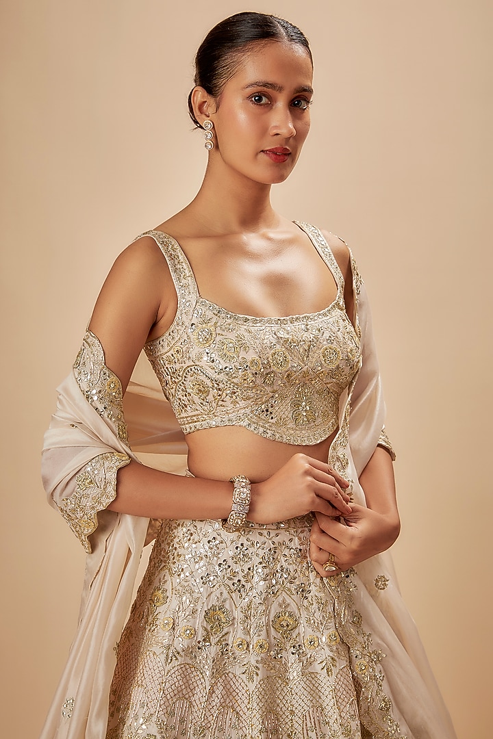 Ivory Silk Embroidered Bridal Lehenga Set by Aneesh Agarwaal at Pernia's Pop Up Shop