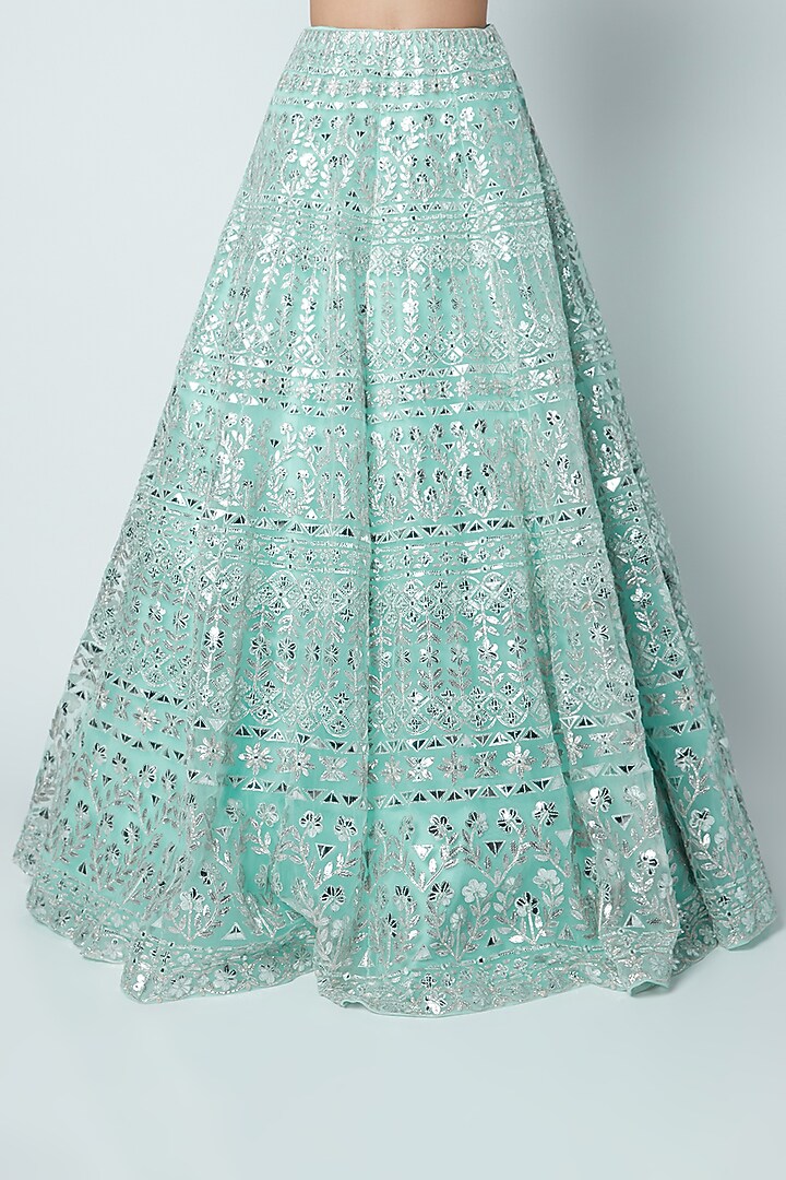 Turquoise Net Foil Applique & Mirror Embroidered Bridal Lehenga Set by Aneesh Agarwaal at Pernia's Pop Up Shop