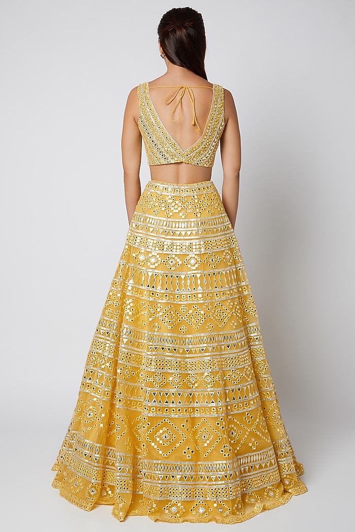 Yellow Net Mirror Embroidered Bridal Lehenga Set by Aneesh Agarwaal at Pernia's Pop Up Shop
