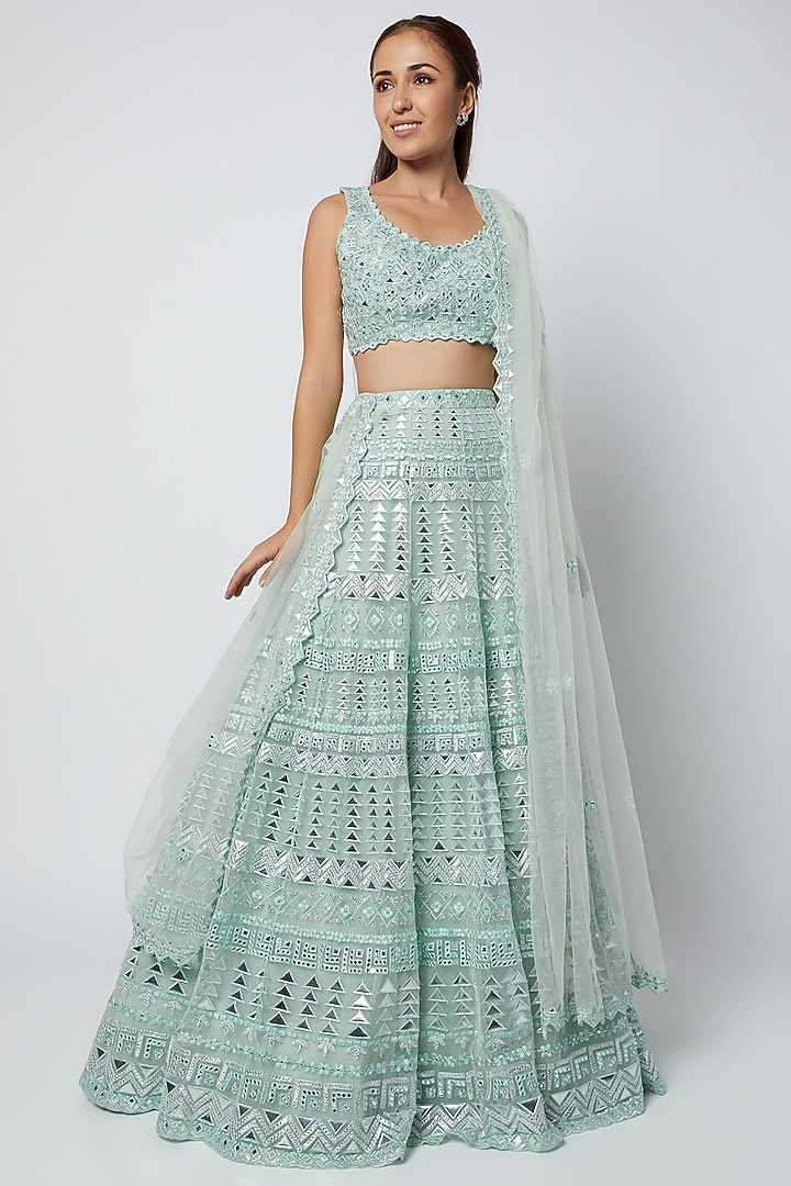Turquoise Net Foil Applique Embroidered Bridal Lehenga Set by Aneesh Agarwaal at Pernia's Pop Up Shop