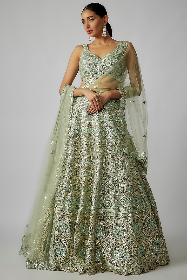Green Net Foil Applique Embroidered Lehenga Set by Aneesh Agarwaal