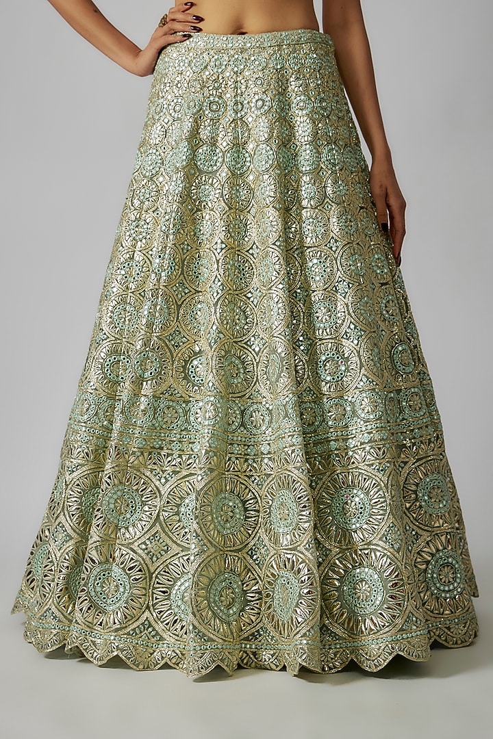 Green Net Foil Applique Embroidered Bridal Lehenga Set by Aneesh Agarwaal at Pernia's Pop Up Shop