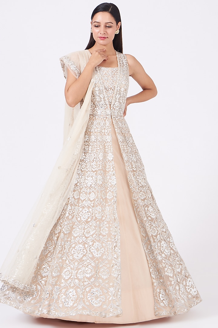 Ivory Net Embroidered Jacket Bridal Lehenga Set by Aneesh Agarwaal at Pernia's Pop Up Shop