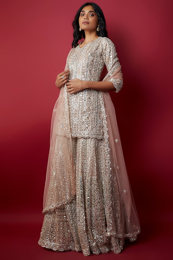 Taupe Net Sequins & Cutdana Embroidered Sharara Set by Aneesh Agarwaal