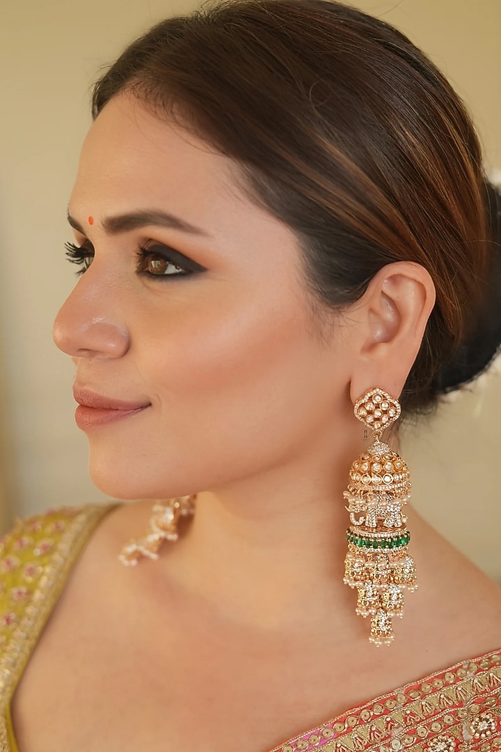 Gold Finish Zircon & Green Stone Jhumka Earrings by ANANA at Pernia's Pop Up Shop