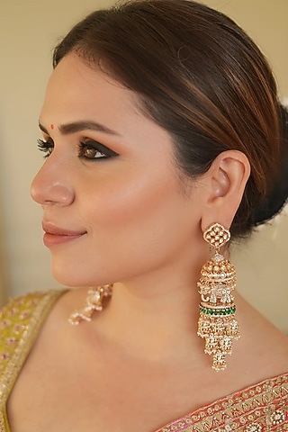 Gold Finish Zircon & Green Stone Jhumka Earrings by ANANA