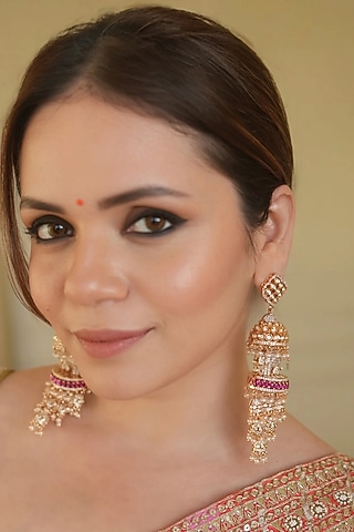 Gold Finish Zircon & Red Stone Jhumka Earrings by ANANA