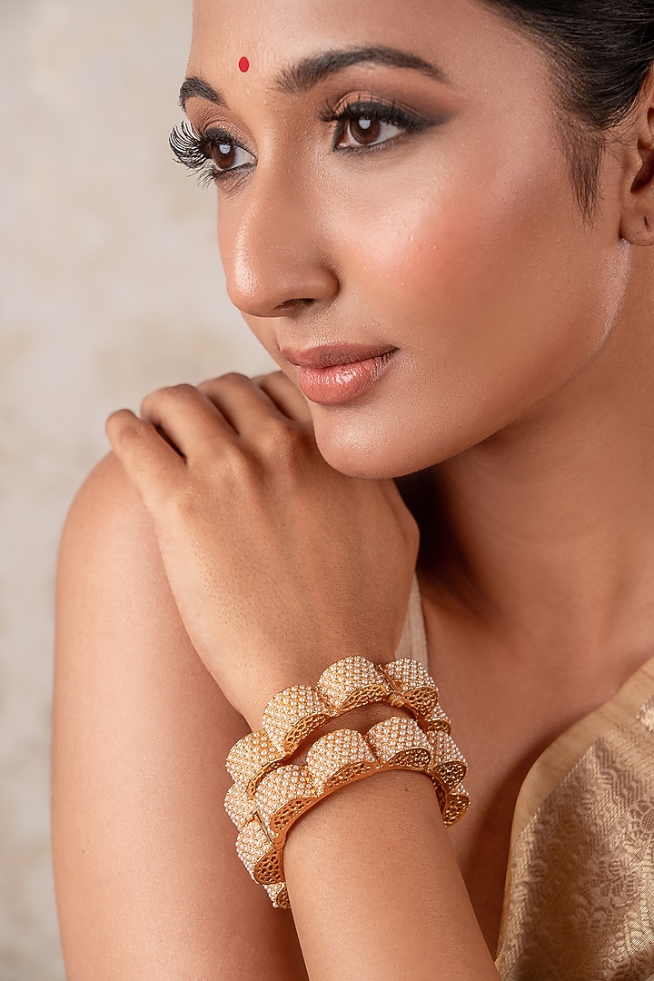 Gold Finish Pearl Bangles (Set Of 2) by ANANA at Pernia's Pop Up Shop