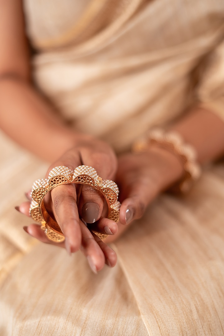 Gold Finish Pearl Bangles (Set Of 2) by ANANA at Pernia's Pop Up Shop