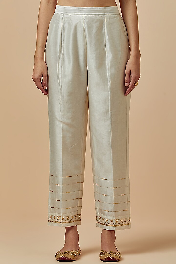 Off-White Hand Embroidered Palazzo Pants by Anantaa By Roohi Trehan