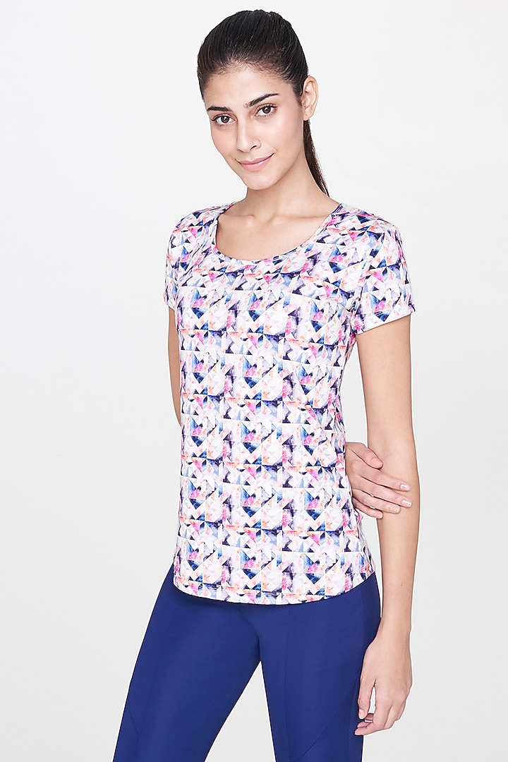 White Printed Top With Blue Leggings by AND at Pernia's Pop Up Shop