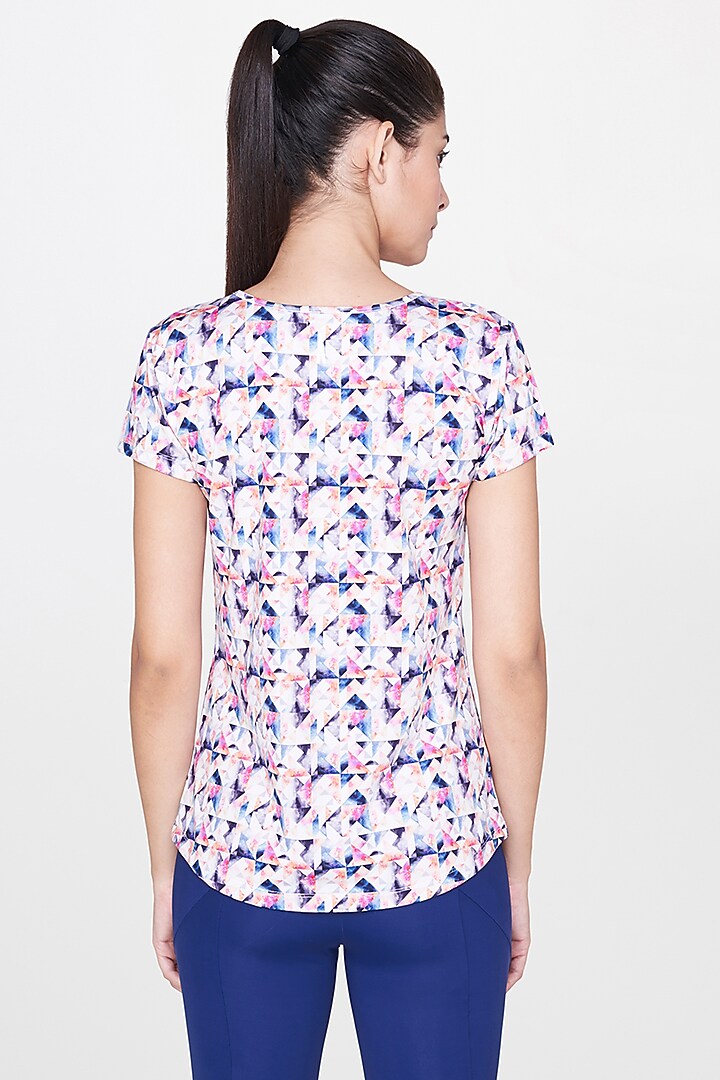White Printed Top With Blue Leggings by AND at Pernia's Pop Up Shop