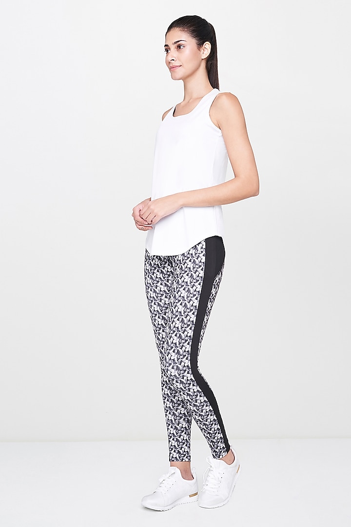 White Tank Top With Grey Leggings by AND