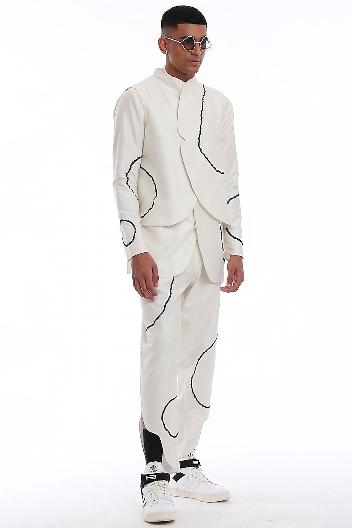 Ivory Cotton Silk Embroidered Trousers by Antar Agni Men