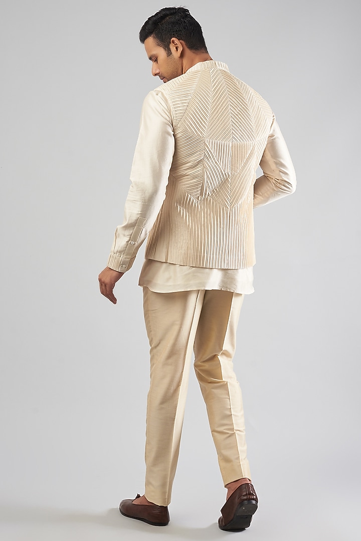 Ivory Cotton Silk Pleated Bundi Jacket by Antar Agni Men at Pernia's Pop Up Shop