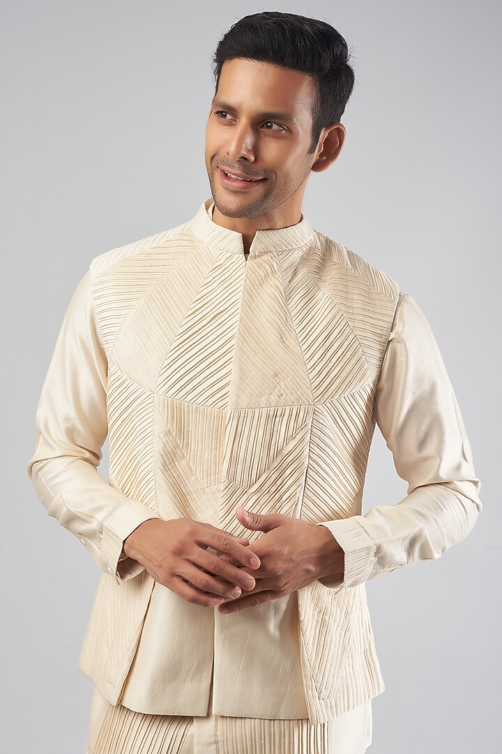 Ivory Cotton Silk Pleated Bundi Jacket by Antar Agni Men at Pernia's Pop Up Shop