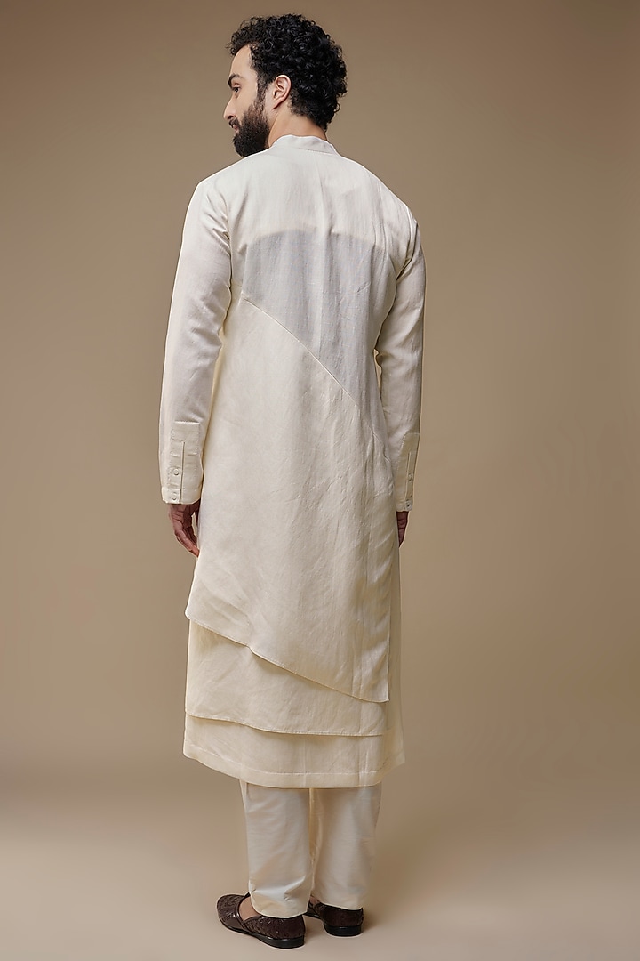 Ivory Cotton Silk Asymmetric Kurta by Antar Agni Men at Pernia's Pop Up Shop
