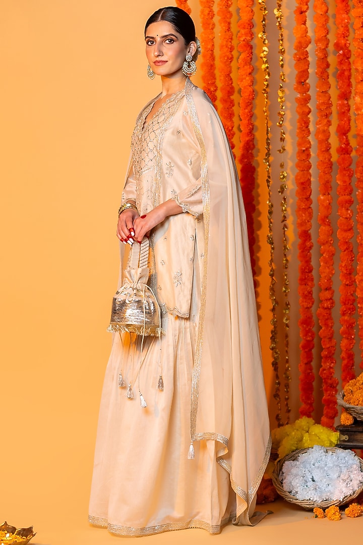 Beige Chanderi Silk Gharara Set by ANGSA BY NIDHIR & SHELLY at Pernia's Pop Up Shop