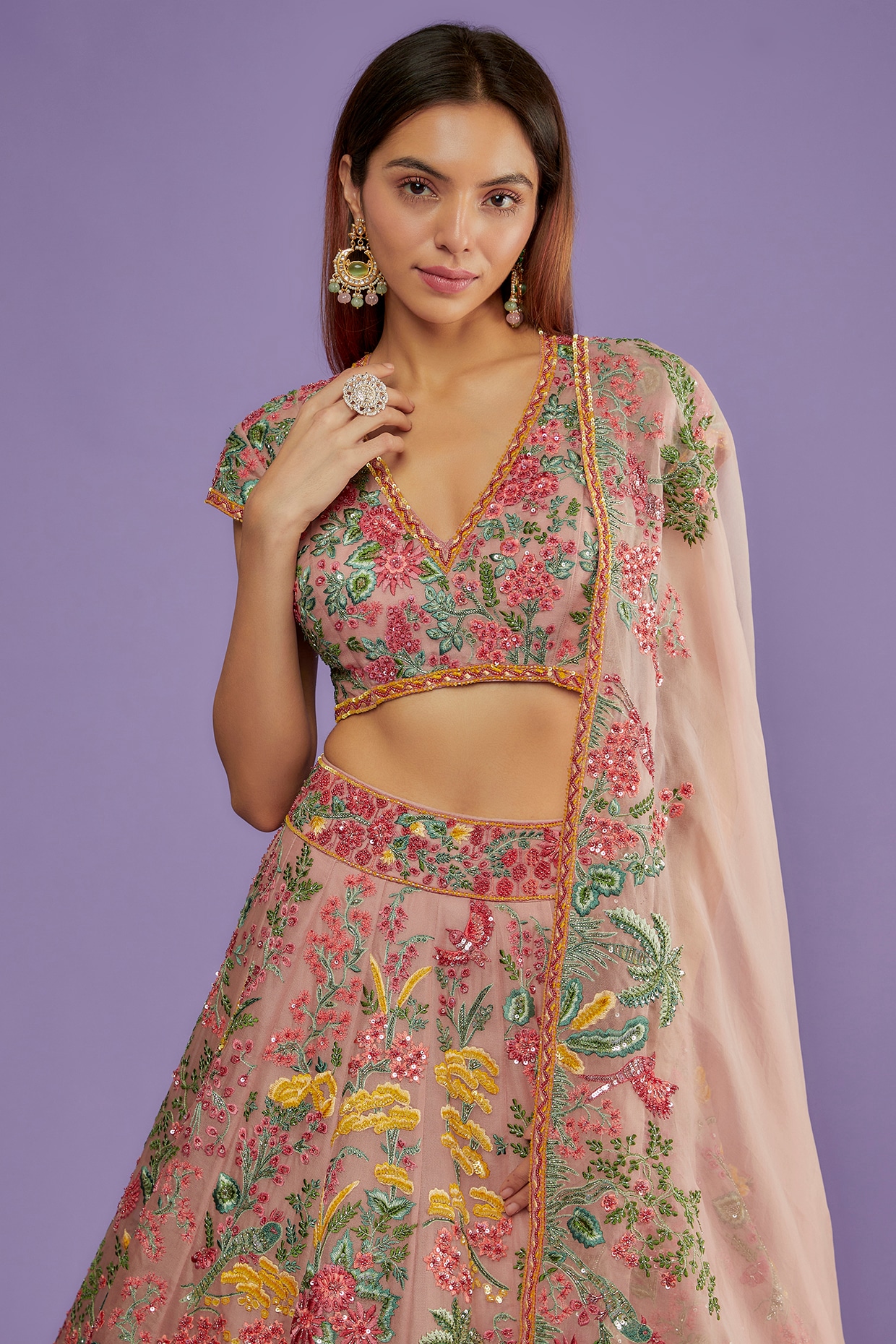Peach and red floral lehenga by Creative Stylista Boutique
