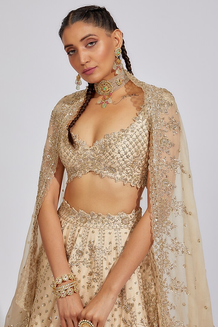 Ivory Raw Silk Embroidered Bridal Lehenga Set by Anushree Reddy at Pernia's Pop Up Shop