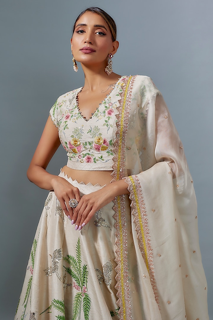 Ivory Raw Silk Hand & Machine Embroidered Bridal Lehenga Set by Anushree Reddy at Pernia's Pop Up Shop