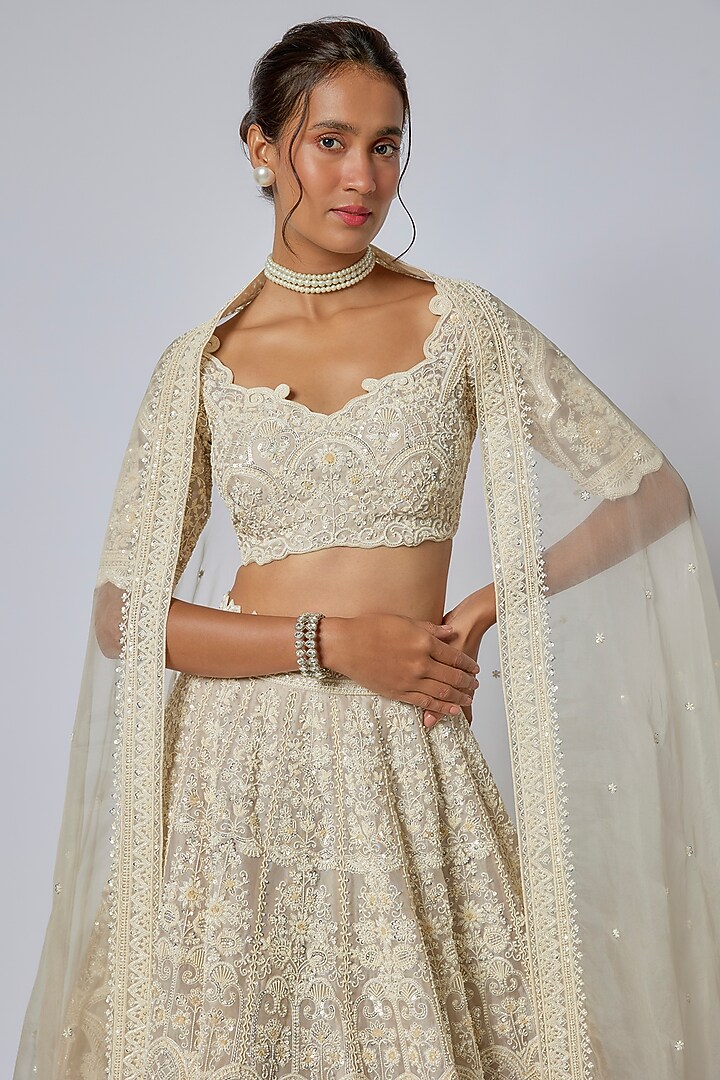 Ivory Organza Hand Embroidered Bridal Lehenga Set by Anushree Reddy at Pernia's Pop Up Shop