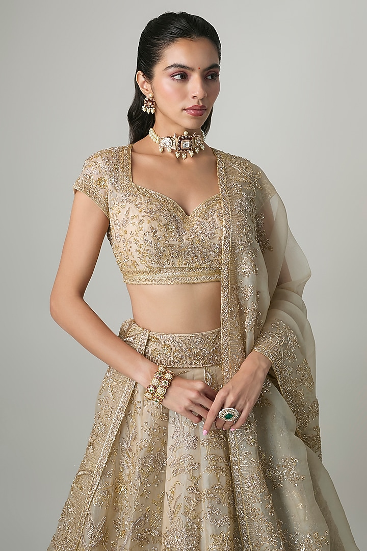 Ivory Organza Hand Embroidered Bridal Lehenga Set by Anushree Reddy at Pernia's Pop Up Shop