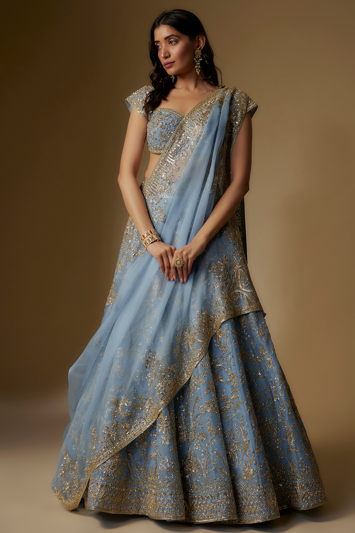Photo of Light pink and blue floral embroidery lehenga