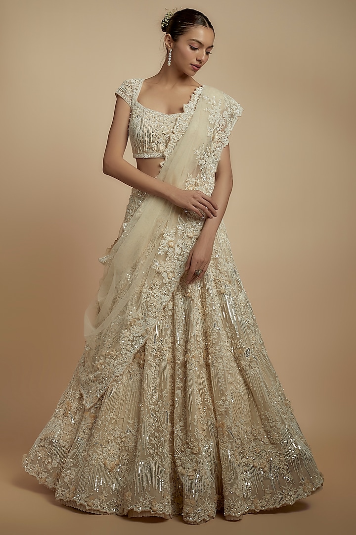 Ivory Net Pearl Embroidered Bridal Lehenga Set by Anushree Reddy at Pernia's Pop Up Shop