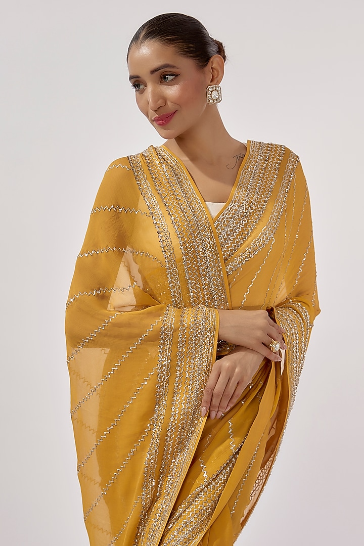 Yellow Chiffon Sequins Hand Embroidered Reception Saree Set by Anushree Reddy at Pernia's Pop Up Shop