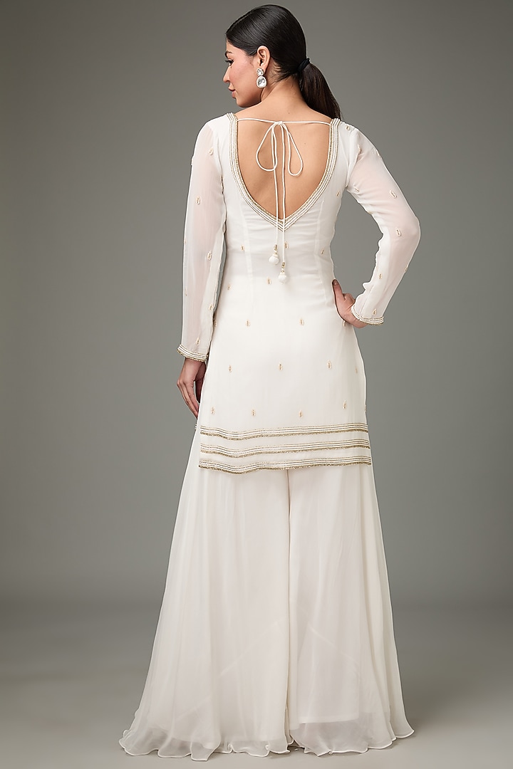 Ivory Flat Chiffon Palazzo Pant Set by ANJALIVERMA at Pernia's Pop Up Shop