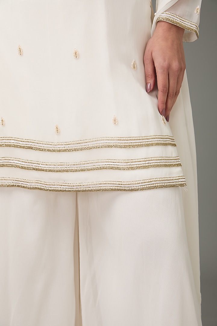 Ivory Flat Chiffon Palazzo Pant Set by ANJALIVERMA at Pernia's Pop Up Shop
