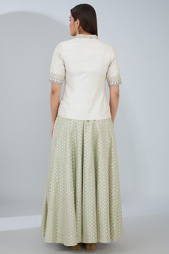 Ivory Raw Silk Aari Embroidered Jacket Set by ANJALIVERMA at Pernia's Pop Up Shop