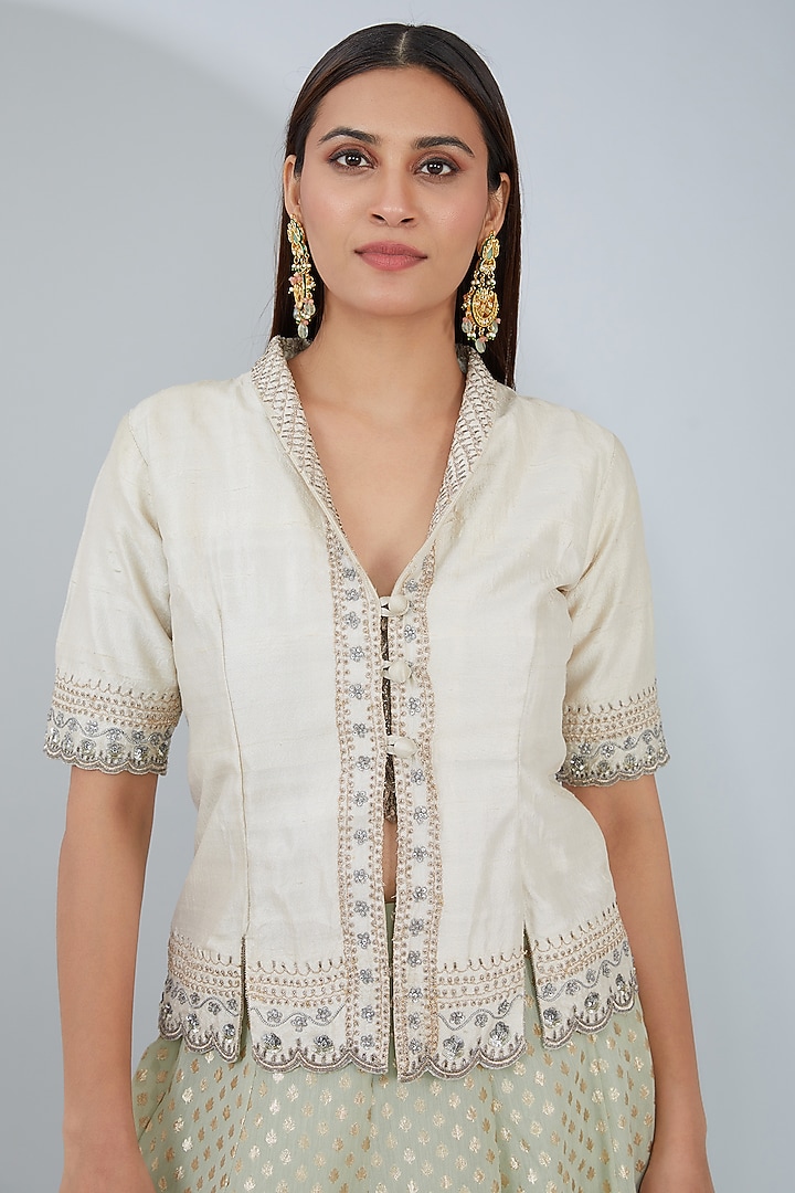 Ivory Raw Silk Aari Embroidered Jacket Set by ANJALIVERMA at Pernia's Pop Up Shop
