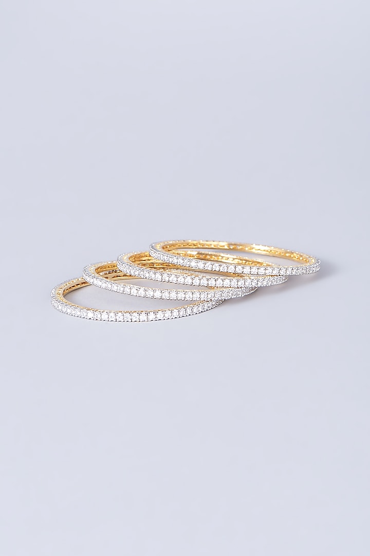 Gold Finish Zircons Bangles (Set of 4) by Anjali Jain Jewellery at Pernia's Pop Up Shop