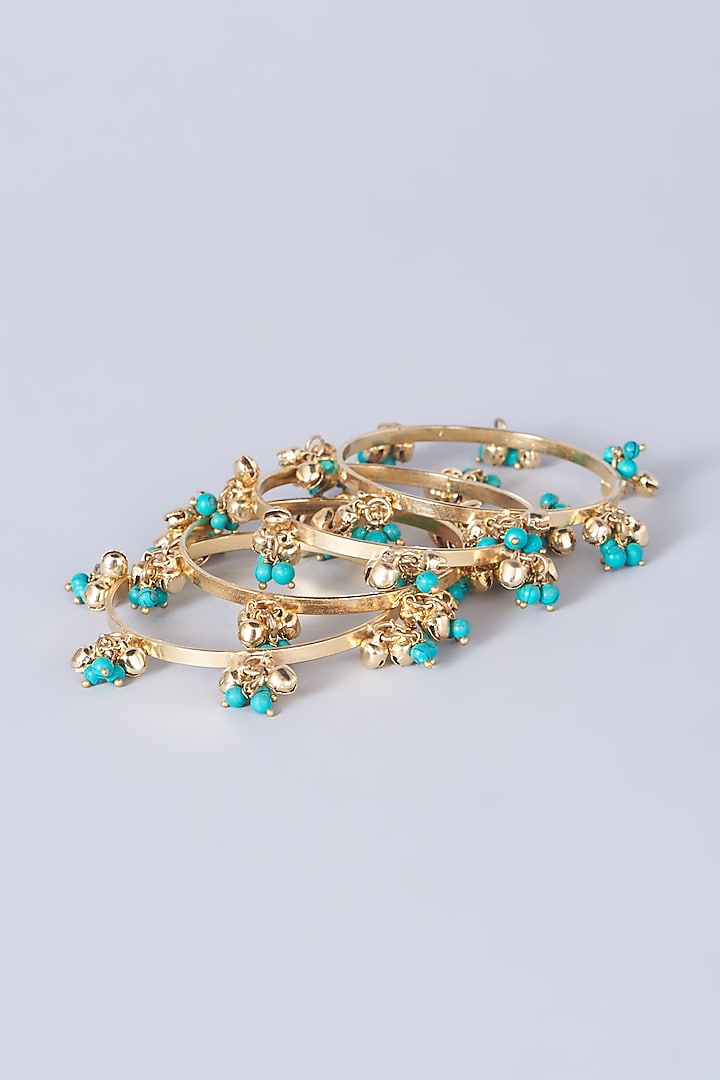 Gold Finish Pearl Bangles (Set of 4) by Anjali Jain Jewellery